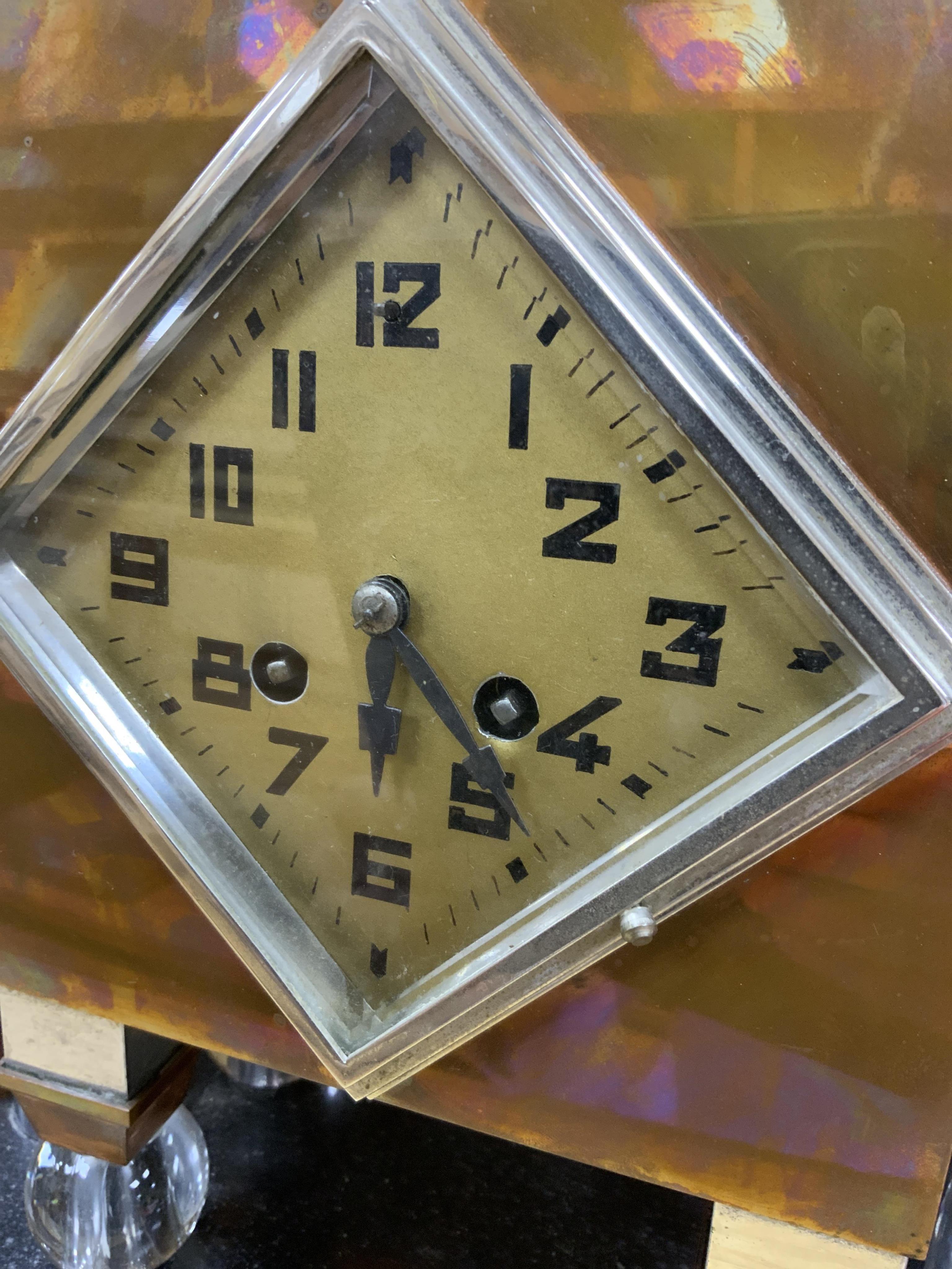 An Art Deco French copper mantel clock with bronze seagull surmount, 53cm